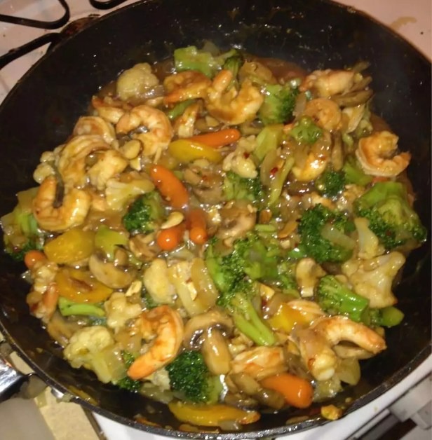 Sauté de crevettes et de brocoli au beurre d’ail